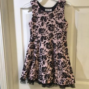 Dress with pink background, and black roses print.
